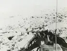 Diverse bilder från Fred Goldbergs samling. Motiv av isbrytaren USS Burton Island som bryter genom is utanför Alaska, 1956.