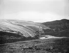 Fotografi från Grönland. Vy över bergslandskap.