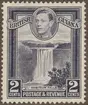 Frimärke ur Gösta Bodmans filatelistiska motivsamling, påbörjad 1950. Frimärke från Brittiska Guiana, 1938. Motiv av Kaieteur Vattenfallet i Brittiska Guiana