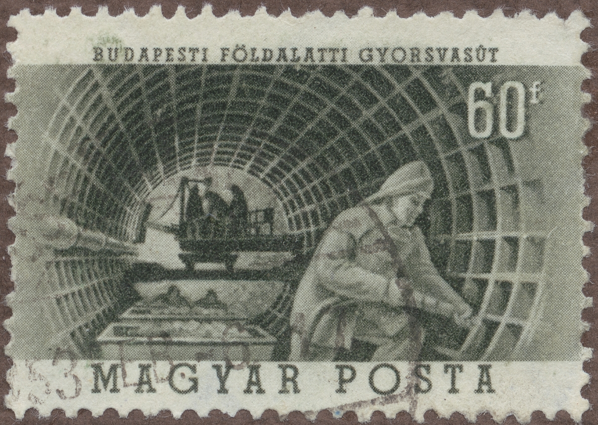 Frimärken ur Gösta Bodmans filatelistiska motivsamling, påbörjad 1950. Frimärke från Ungern, 1953. Motiv av Ungerskt tunnelbygge i Budapest "-5-årsminne av tunnelbyggets början: 1848-1953"
