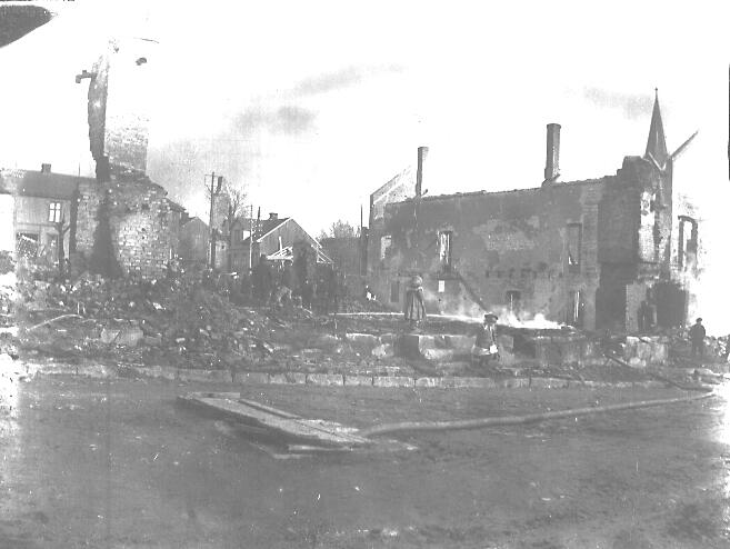 Branntomt fra  på torget i 1902