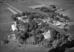 Vy över Ekeby kyrka 1964.