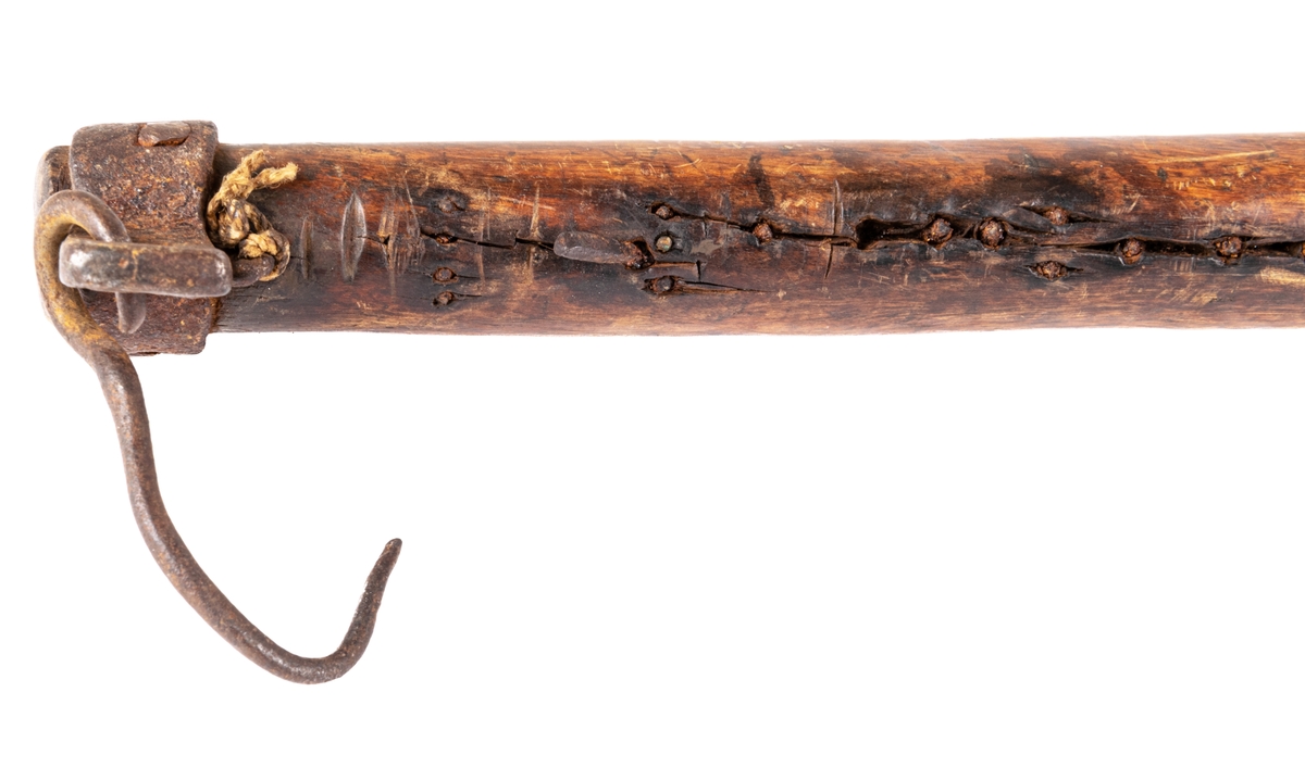 Besman av trä, avlång tyngd.