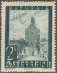 Frimärke ur Gösta Bodmans filatelistiska motivsamling, påbörjad 1950.
Frimärke från Österrike, 1947. Motiv av tvåmotorigt monoplan över stadshuset i staden Gmund
