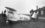 Flygplan Sk 10 nr 5535, uppställd bakom snickarverkstaden vid Centrala Verkstäderna på Malmen, omkring 1934-1935.