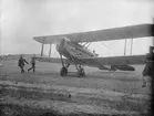 Flygplan de Havilland 37, G-EBDO med motorn igång under flygtävlingarna på Torslanda vid Internationella luftfartsutställningen (ILUG) 1923. Flygförare var H Hemming.