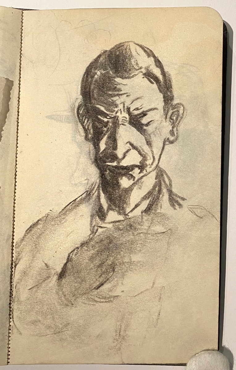 Brun skissebok [Tegning]