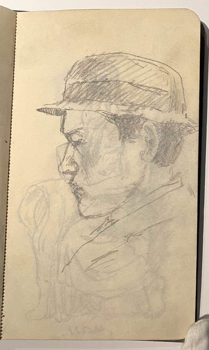 Brun skissebok [Tegning]