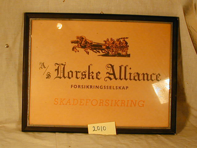 Reklameplakat i glas og ramme for A/S Norske Alianse.