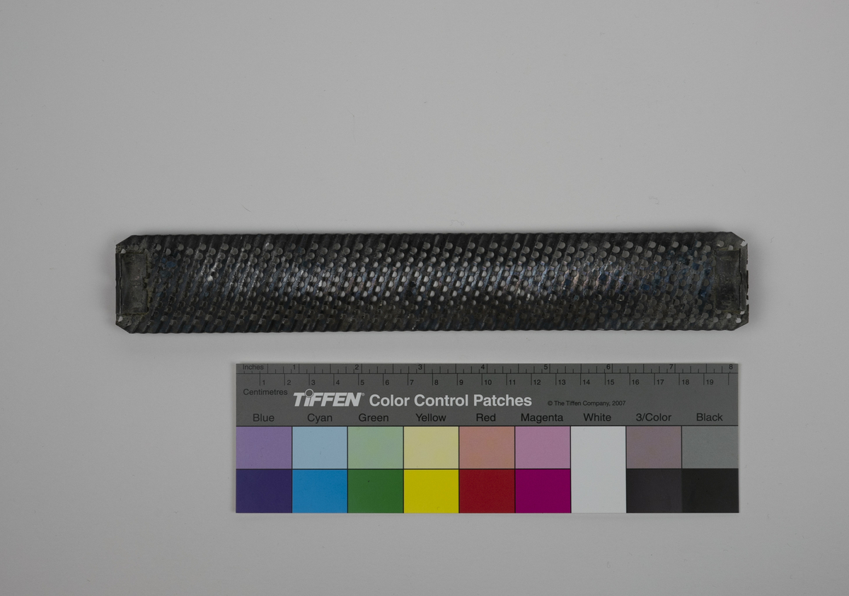 Rasp brukt av Nils Aas til modellering. Det er rester etter gips på raspa.