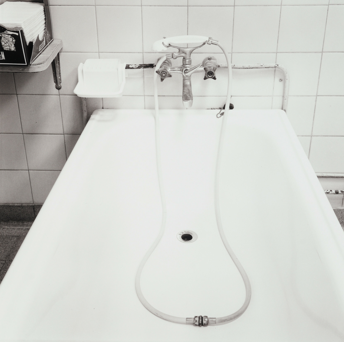 Badekar med forlenget dusjslange.