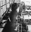 Interiör av Centrala flygverkstaden Malmslätt vid montering av flygplan B 4 Hawker Hart, 1930-tal.