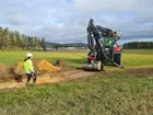 Arbetsbild från arkeologisk utredning i Säversta, Bollnäs sn, Bollnäs kn. Foto mot norr.