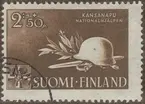 Frimärke ur Gösta Bodmans filatelistiska motivsamling, påbörjad 1950.
Frimärke från Finland, 1943. Motiv av Vapensymboler Hjälm Svärd