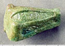 Djurhuvudformade spännen