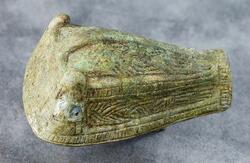 Djurhuvudformade spännen