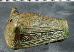 Djurhuvudformade spännen