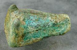 Djurhuvudformade spännen