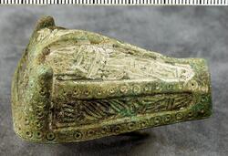 Djurhuvudformade spännen