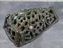 Djurhuvudformade spännen