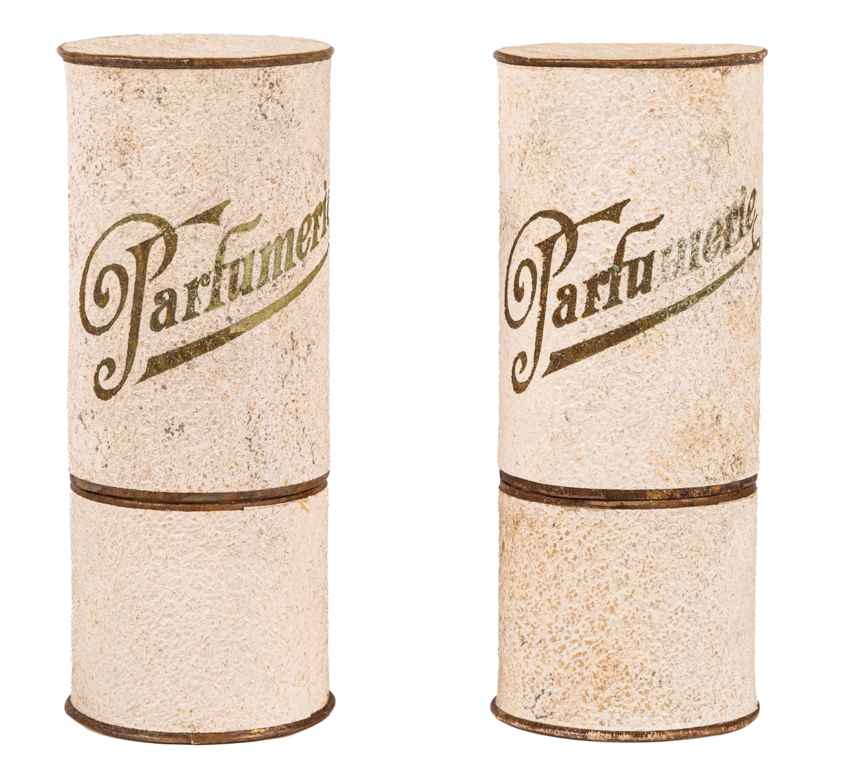 Parfymask i papp, cylinderformad, i glansigt vitt papper med guldfärgad text "Parfumerie".