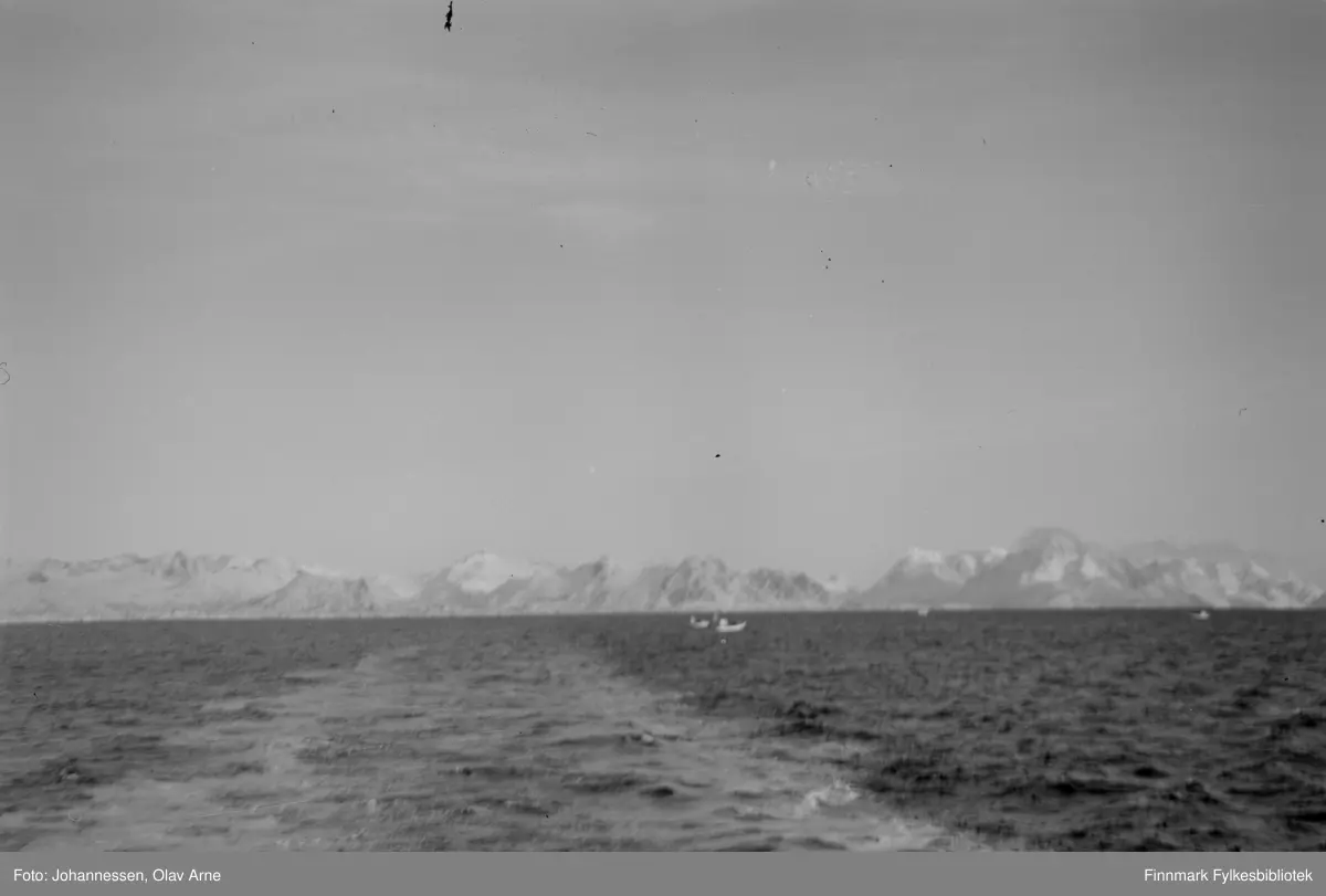 Foto av vinterlandskap og båt 