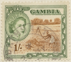 Frimärke med motiv av jordbrukande kvinna i Gambia och drott