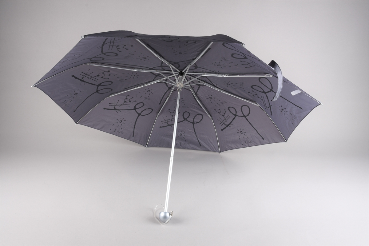 Kulturbymotiv, sol og regn.