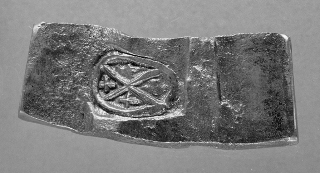 Avtryck av järnstämpel i prov av stångjärn. 