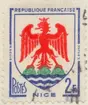 Frimärke ur Gösta Bodmans filatelistiska motivsamling, påbörjad 1950.
Frimärke från Frankrike, 1958. Motiv av Vapen: Staden Nice. 