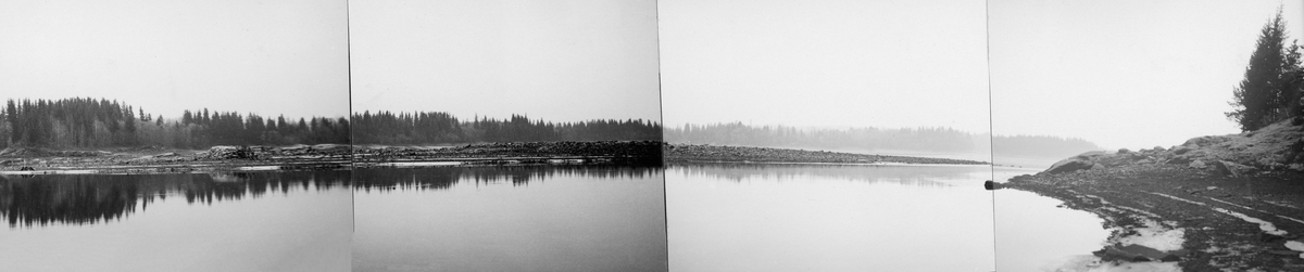 Jutulbrua - en bergrygg som går på tvers av Glomma like sør for Onstadsundet, tre-fire kilometer nedenfor Solbergfoss kraftstasjon. Ved lavvann, som da dette fotografiet ble tatt, sperrer denne ryggen en stor del av elveløpet. Dette er et panorama, sammensatt av fire bilder.