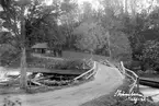 Miljön kring Strömbron vid Malfors omkring 1925. Överfarten ersattes med en ny bro invid Cloettas fabriksanläggning i samband med tillkomsten av Malfors kraftstation i mitten av 1930-talet.