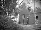 Bildsvit från Kalborgs kafferosteri på Älvgatan 39. Huset användes tidigare av Yllefabriken men efter brand i lokalerna på Drottninggatan 4 flyttade Kalborgs dit. Bilden tagen 1935.