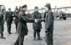 Inspektion av den nytillträdde Militärbefälhavaren för Östra militärområdet, generallöjtnant Nils Sköld den 5 december 1974

Lagnö garageområde, 

Bild 1 frv kaptenerna Alf Gustavsson och Yngve Pettersson, överste Ragnar Tauvon, MB, överstelöjtnant Björn Bernroth och kapten Karl-Arne Ahlqvist.

Bild 2 frv överste Ragnar Tauvon, överstelöjtnant Gunnar Dickfelt, MB följebefäl, MB, överstelöjtnant Björn Bernroth, överstelöjtnant Uno Hällkvist och (delvis skymd) kapten Yngve Pettersson.