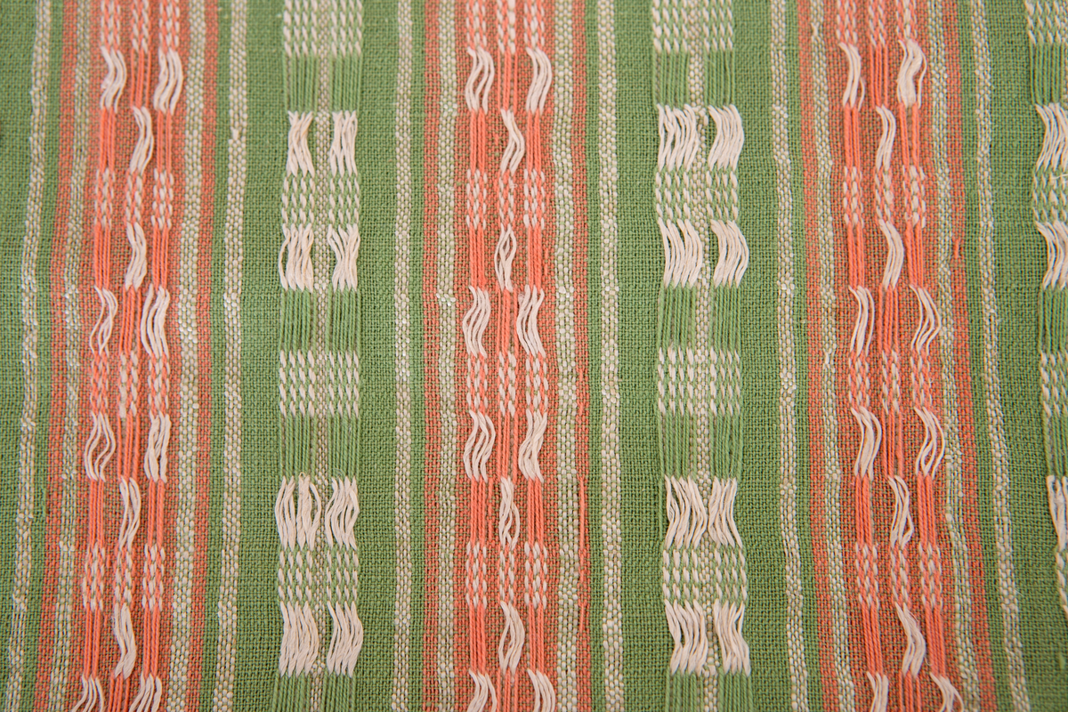 Provet har en maskinskriven papperslapp med texten: B. Gyllenhammar. Möbeltyg i bundet munkabälte. Material: Bomull. 1912-1915.