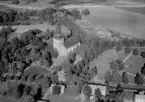 Flygfoto över Buskåker, Stora Tuna, Borlänge 1958.