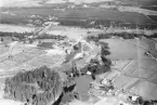 Flygfotografi över Mackmyra sulfitfabrik.