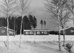 Skogsstation med matsalsbarack. Uddeholms aktiebolag.