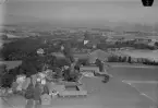 Flygfoto över Buskåker, St. Tuna, Borlänge 1935-1937.