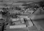 Flygfoto över Buskåker, Stora Tuna, Borlänge 1964.