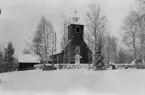 Envikens kyrka 1946. God Jul och Gott Nytt År. Läs mer om Envikens gamla kyrka i boken: Dalarnas kyrkor i ord och bild.
