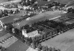 Flygfoto över Järna kyrka, Dalarna. Läs mer om Järna kyrka i boken: Dalarnas kyrkor i ord och bild.