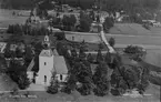 Flygfoto över Malung. Läs mer om Malungs kyrka i boken: Dalarnas kyrkor i ord och bild.