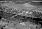 Flygfoto över Husby kyrka år 1964.