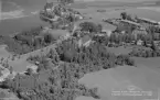 Flygfoto över Gustafs. Gustafs kyrka, år 1950.