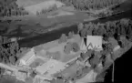 Flygfoto över Torsångs kyrka, Borlänge 1956.