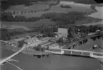 Flygfoto över Torsång med Torsångs kyrka år 1935-1937.