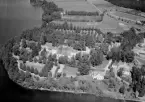 Flygfoto över Leksands kyrka. Läs mer om Leksands kyrka i boken: Dalarnas kyrkor i ord och bild.