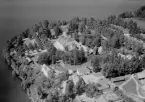 Flygfoto över Leksand. Leksands kyrka. Läs mer om Leksands kyrka i boken: Dalarnas kyrkor i ord och bild.