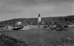 Flygfoto över Lima kyrka. Läs mer om Lima kyrka i boken: Dalarnas kyrkor i ord och bild.